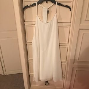 White dress with jeweled embellishment on back